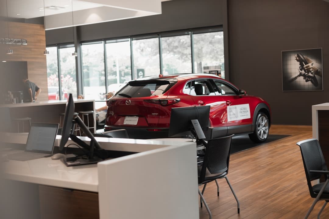 Dealership service advisor scanning customer paperwork